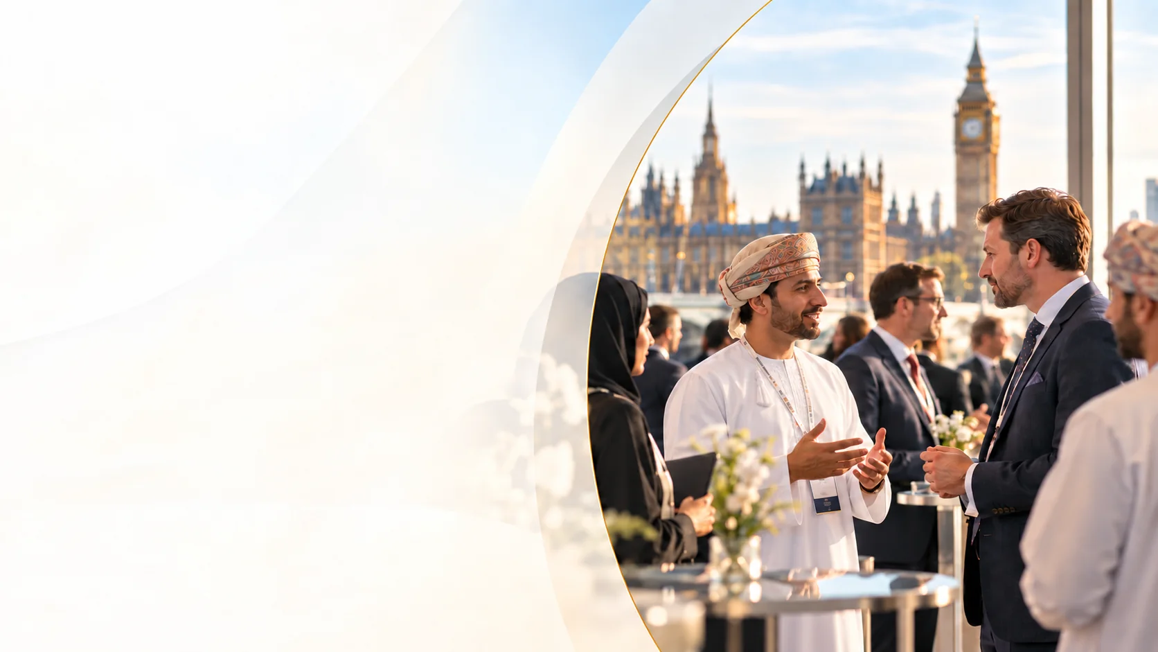Omani and British business leaders in conversation on a terrace overlooking the Palace of Westminster